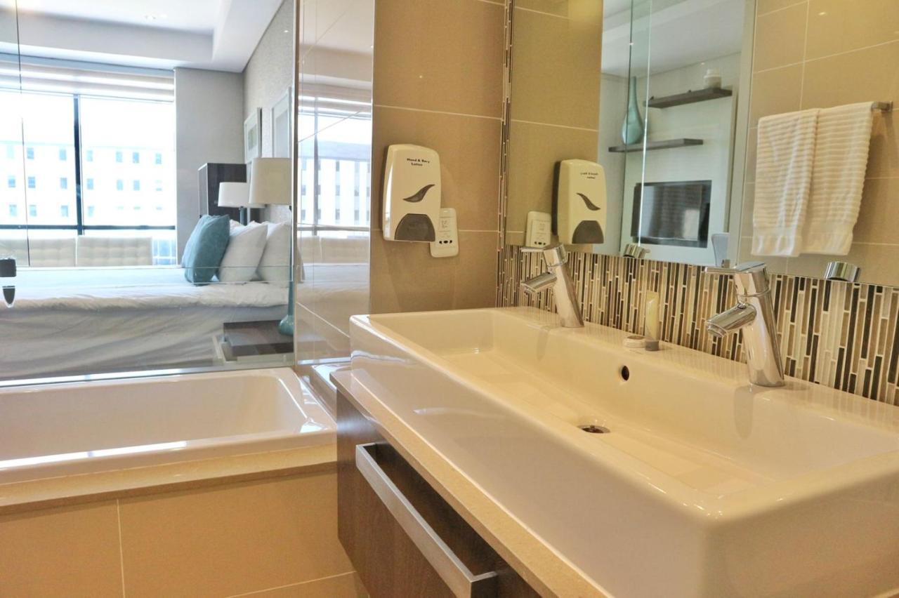 Sandton Skye Apartments ヨハネスブルグ エクステリア 写真
