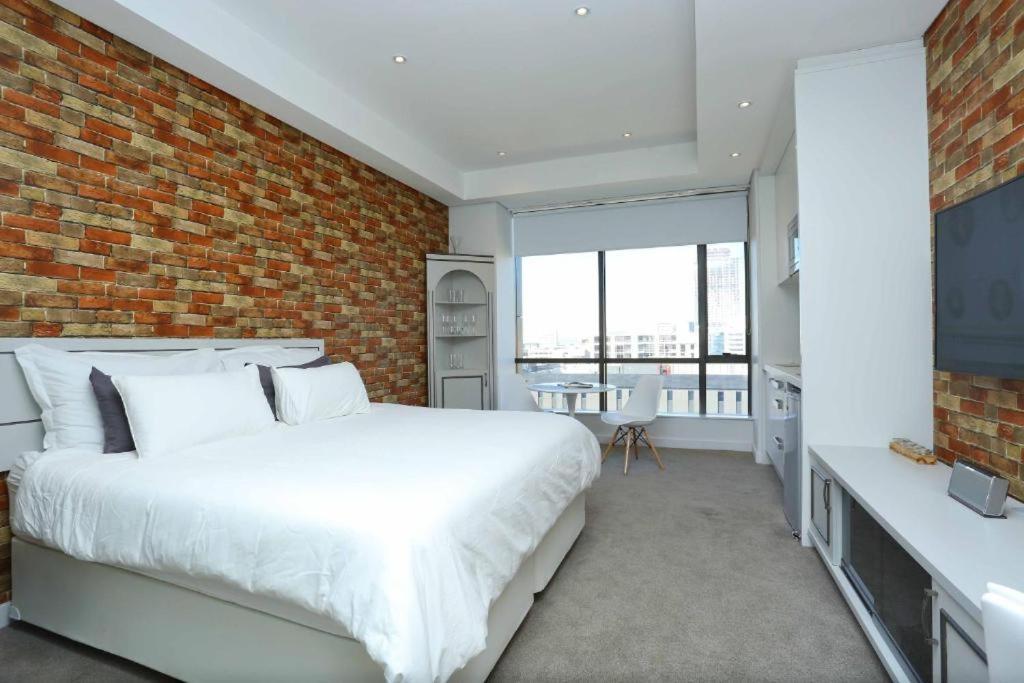 Sandton Skye Apartments ヨハネスブルグ エクステリア 写真